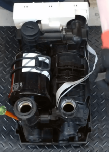 dab pump repair showing the pressure tank and the motor