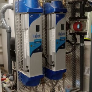 Two Hallet UV pure water treatment systems used in a basement