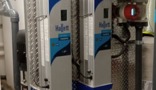 Two Hallet UV pure water treatment systems used in a basement